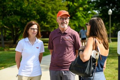 Laura Sands (left) and Tim Sands greeted families and students who moved onto Virginia Tech's Blacksburg campus last week.
