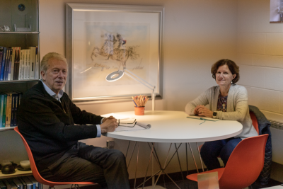 Paul Knox (at left) and Susan Sumner discuss The Justice Challenge.