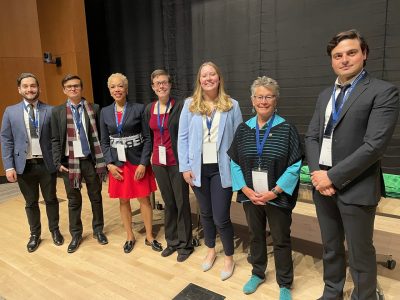 Standing on a stage at Yale University, Virginia Tech's 2023 Bouchet Honor Society scholars , including Joao Santos, Welington Santos, Tuwanda Green, Catherine Cotrupi, Kelsey Reed, Karen DePauw, former vie president and dean for graduate education, and Giuseppe Cotardo. 