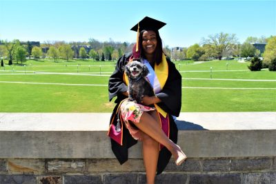 Laila Ampy-Thomas with her dog.